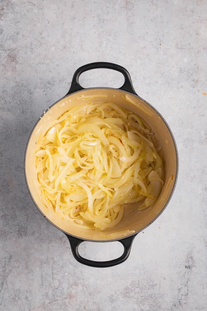 A pot of onions and garlic sweating off in olive oil.